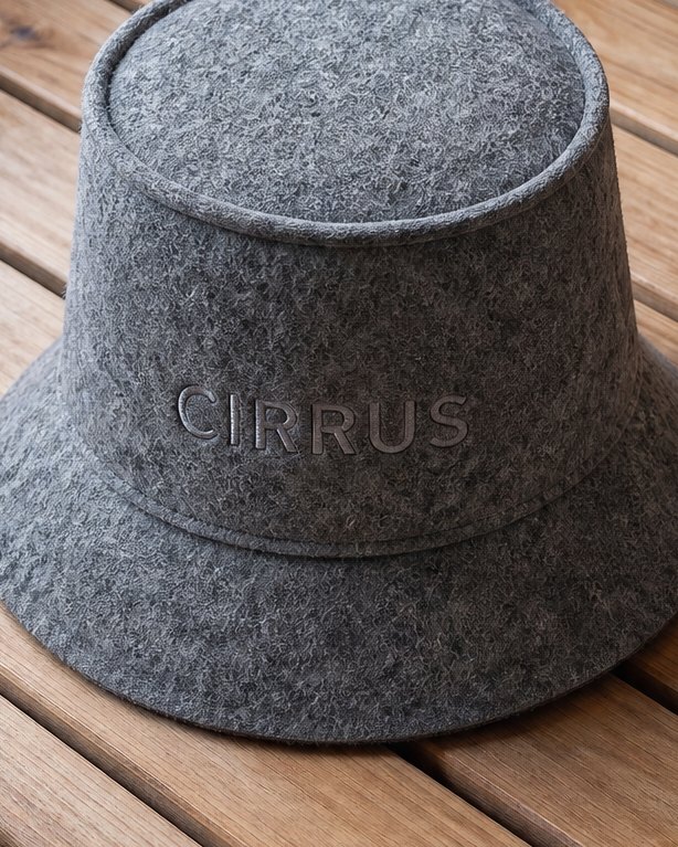 Close view of Shaela wool felt with the embroidered wordmark