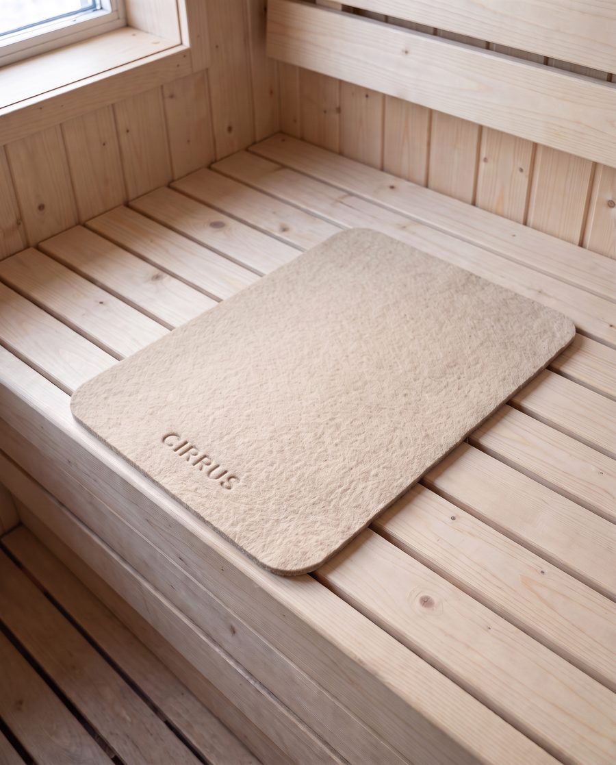 Undyed wool felt bench mat on a pine bench